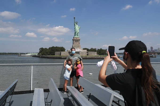 |美国新冠肺炎确诊超487万，政府取消全球旅行警告
