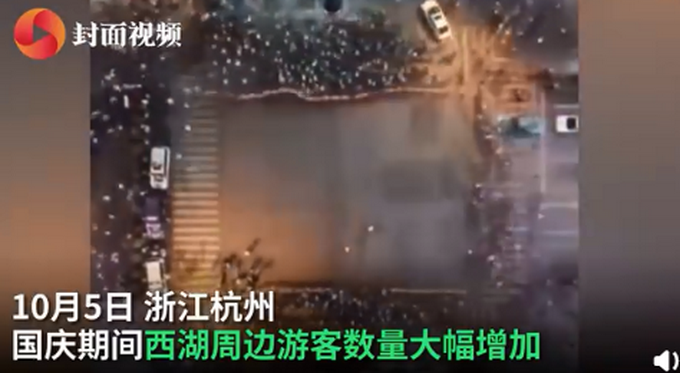 热点|西湖千名志愿者手拉手维持秩序，还有外国小哥汉语喊话维持交通